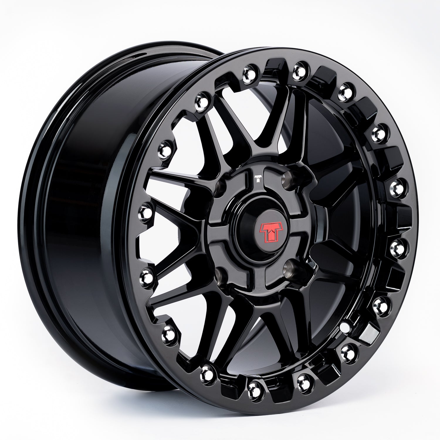 Black alloy wheel with a brand logo on a white background